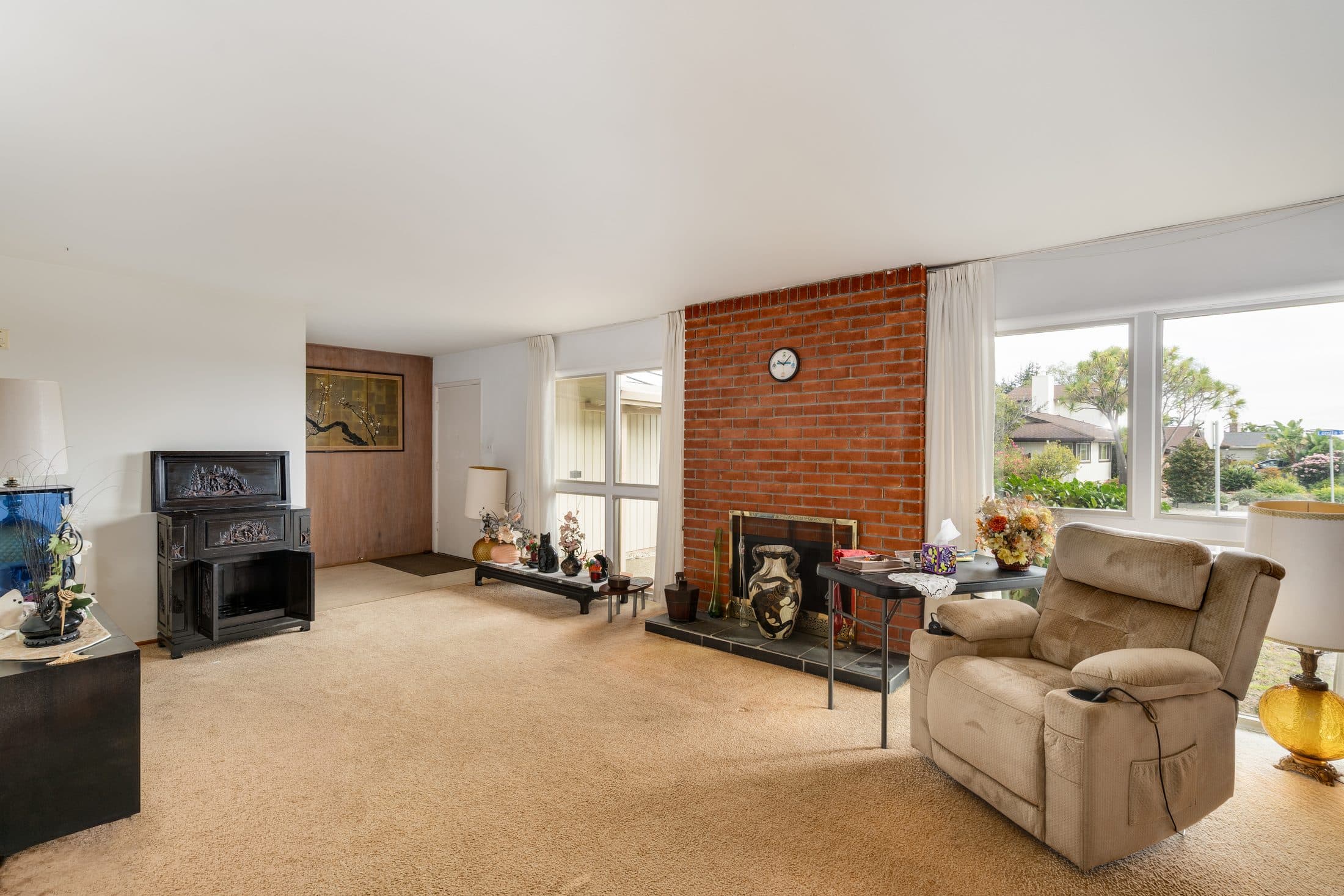 898 Lomita Avenue. The living room, with windows to the street.