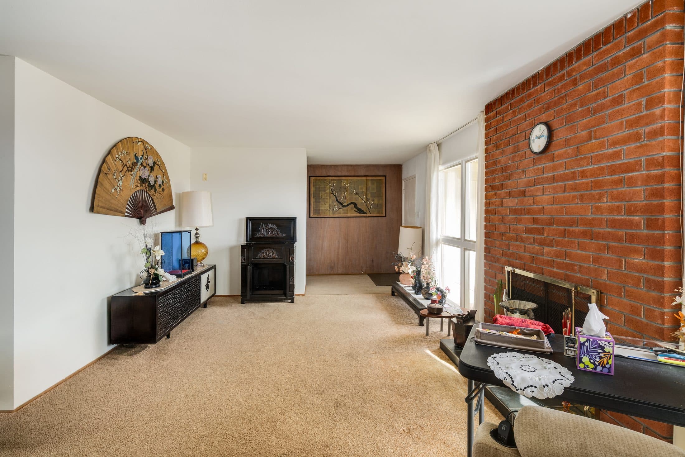 898 Lomita Avenue. The living room fireplace wall.