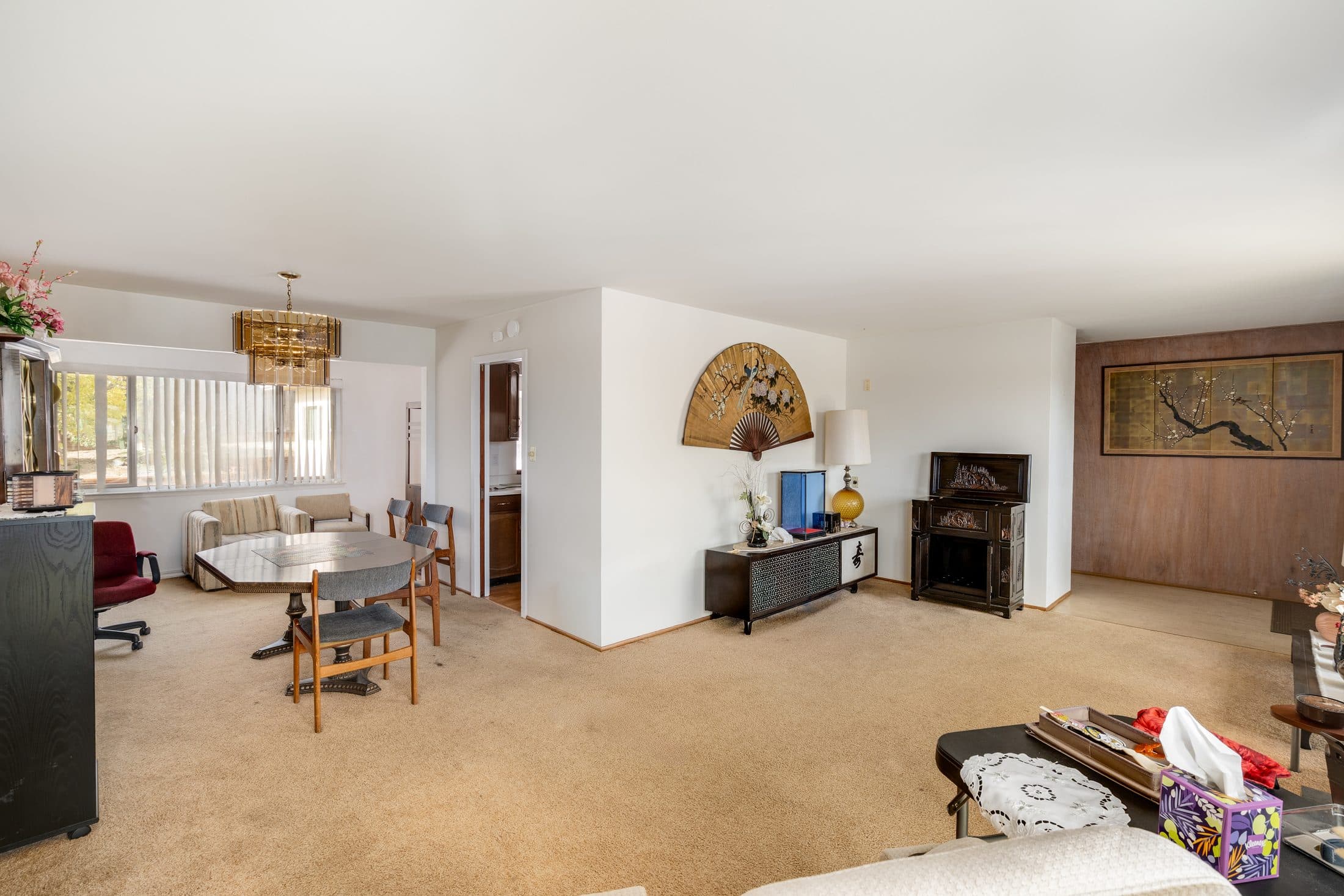 898 Lomita Avenue. The living room opening to the dining area.