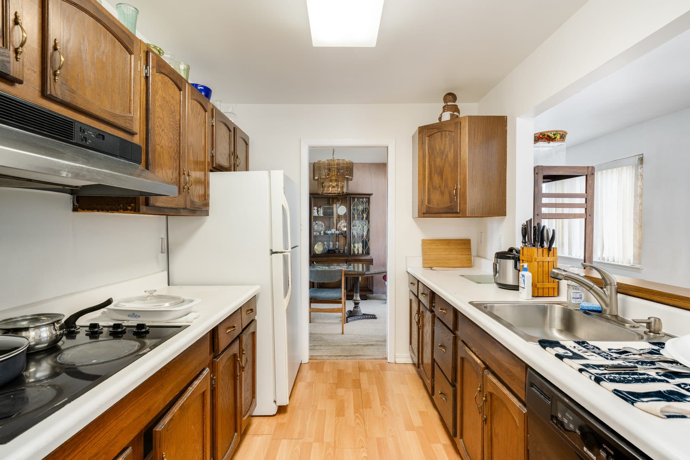 898 Lomita Avenue. The kitchen, looking through to the dining area.