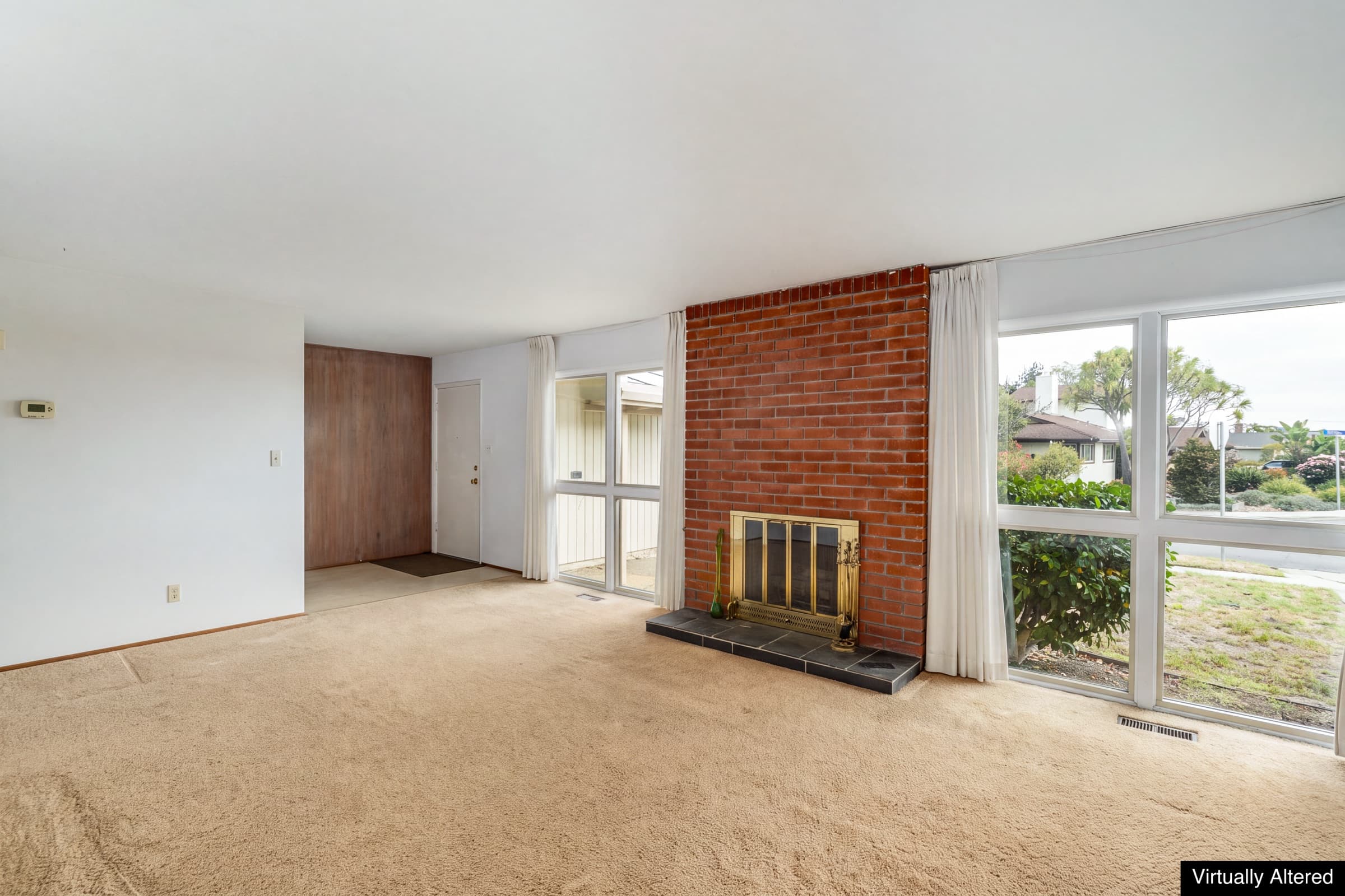 The living room, virtually emptied of furnishings.